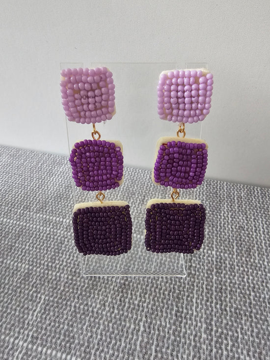 Purple beaded dangle earrings