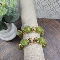 green bracelets What's Hot