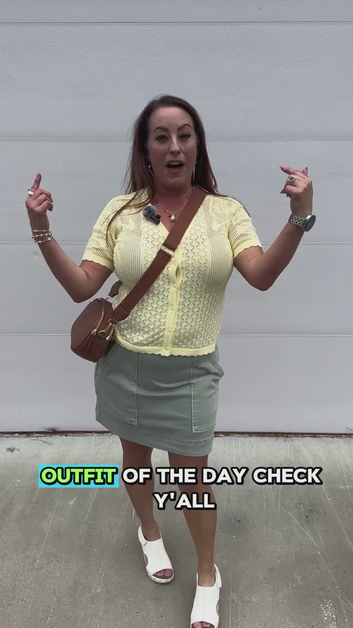 Load and play video in Gallery viewer, Buttercup Button Sweater
