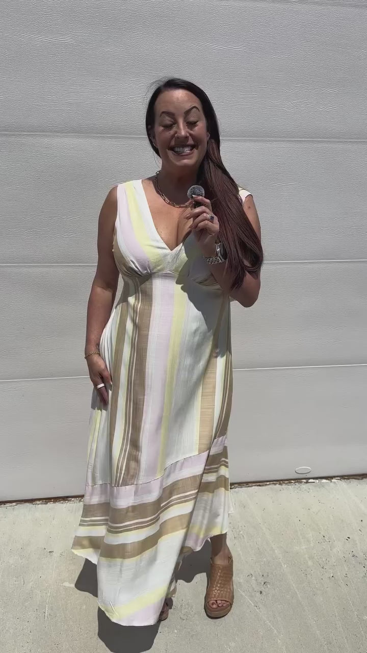 Load and play video in Gallery viewer, Melissa Asymmetrical Print Dress
